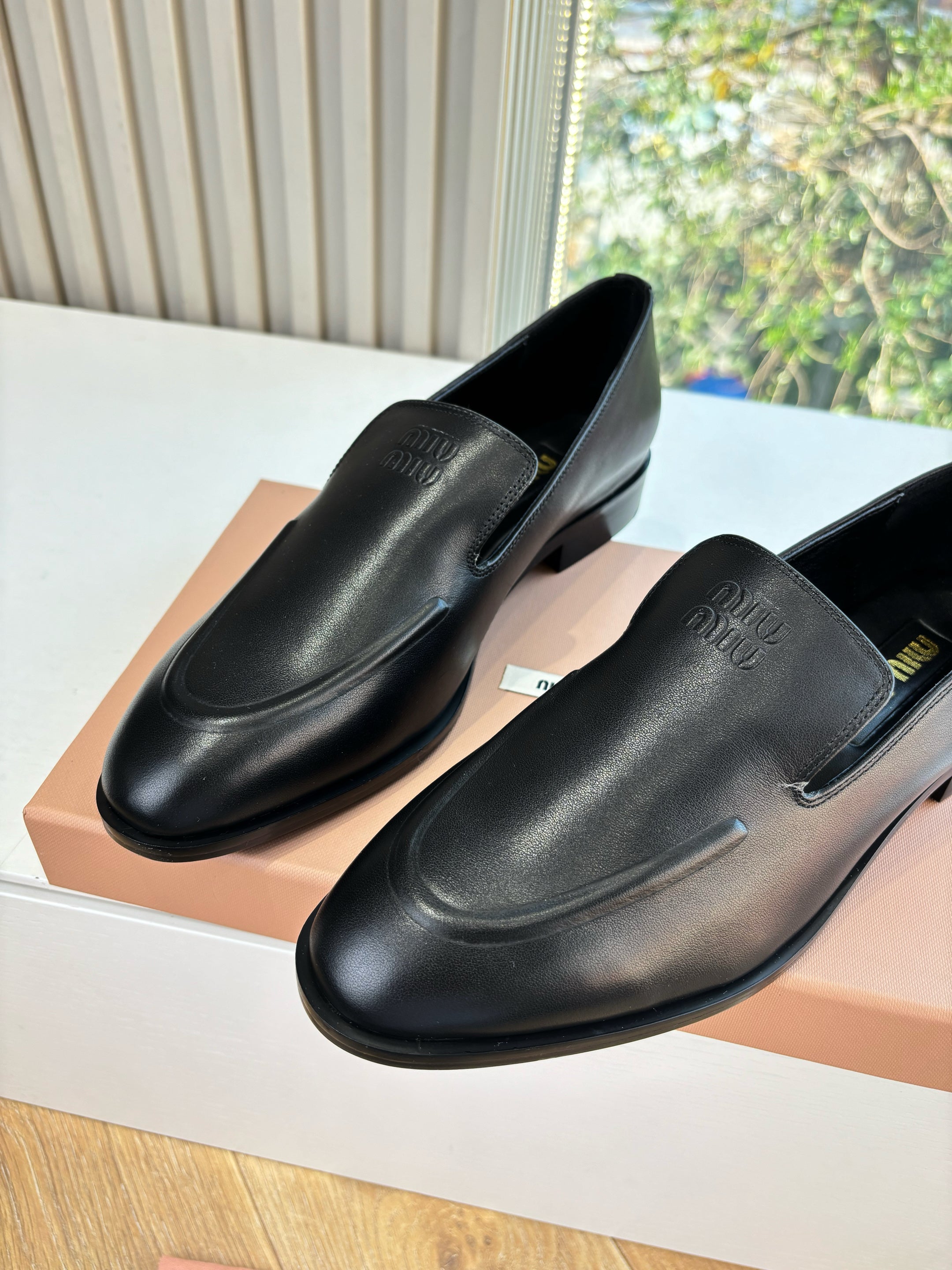 MIUMIU 26S LOAFERS IN BLACK LAMBSKIN