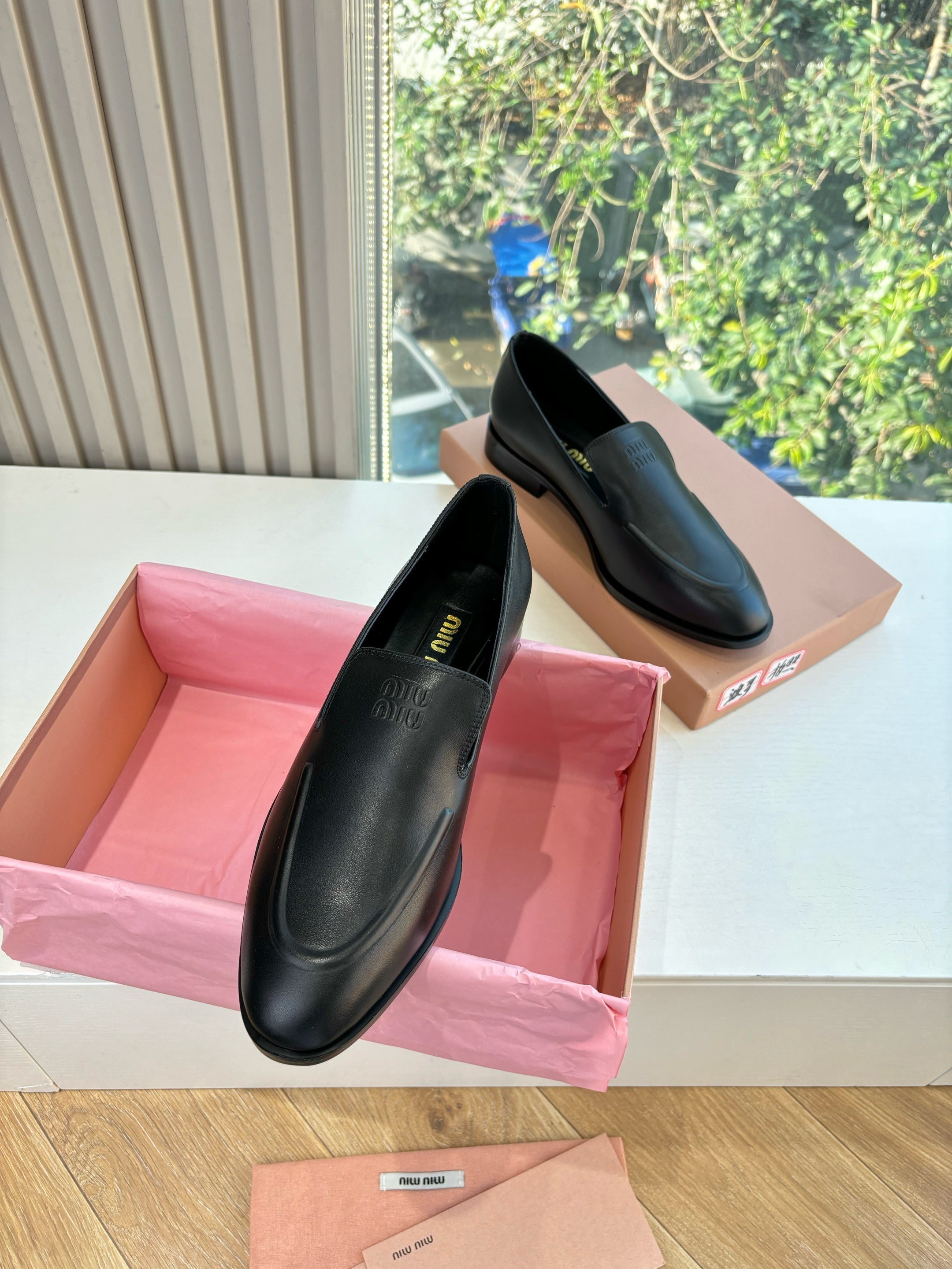MIUMIU 26S LOAFERS IN BLACK LAMBSKIN