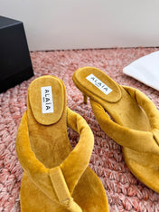ALAIA 26S HEELED THONG SANDALS IN MUSTARD YELLOW VELVET