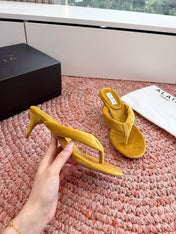 ALAIA 26S HEELED THONG SANDALS IN MUSTARD YELLOW VELVET