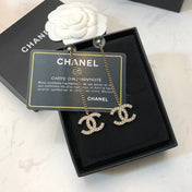 CHANEL 26S DOUBLE C LOGO PEARL PAVE DROP CHAIN EARRINGS IN GOLD METAL 631010