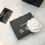 CHANEL 26S DOUBLE C LOGO PEARL PAVE DROP CHAIN EARRINGS IN GOLD METAL 631010