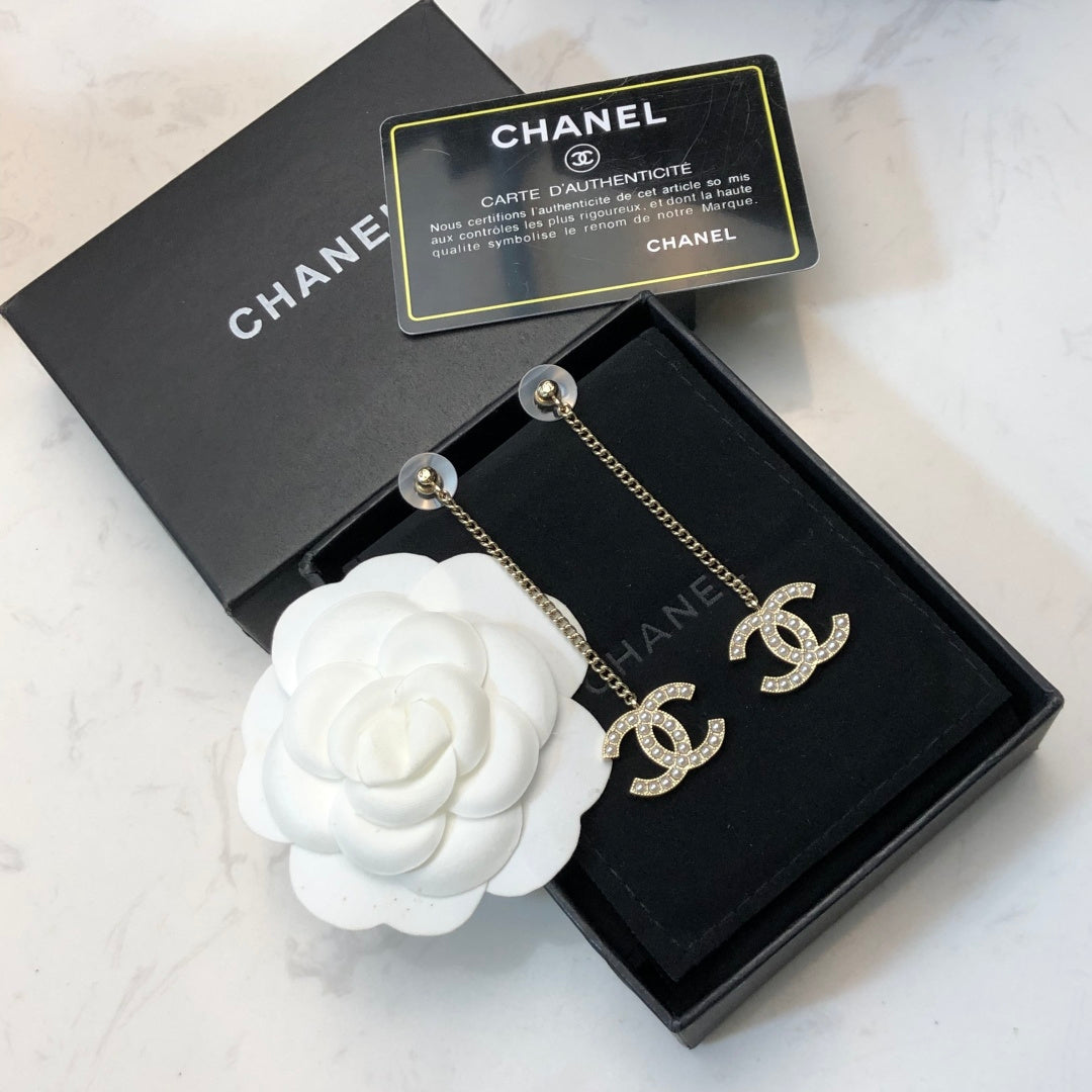 CHANEL 26S DOUBLE C LOGO PEARL PAVE DROP CHAIN EARRINGS IN GOLD METAL 631010