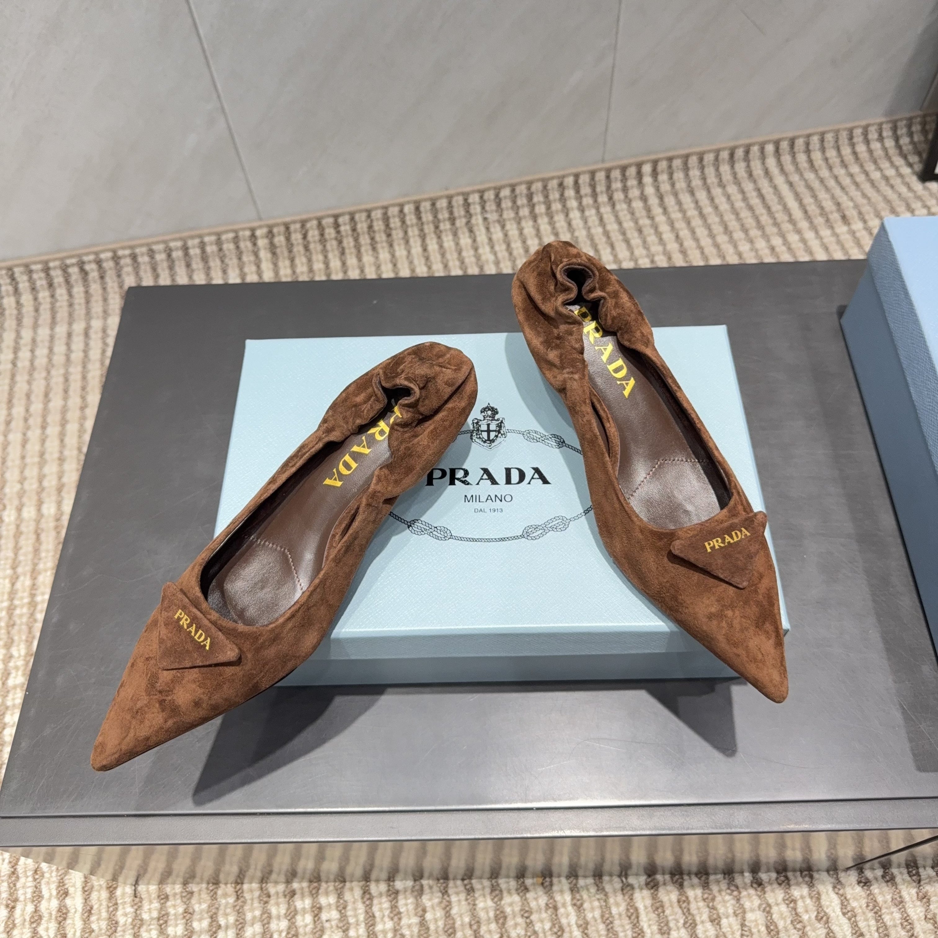 PRADA 26S PUMPS 55MM IN BROWN SUEDE WITH LOGO