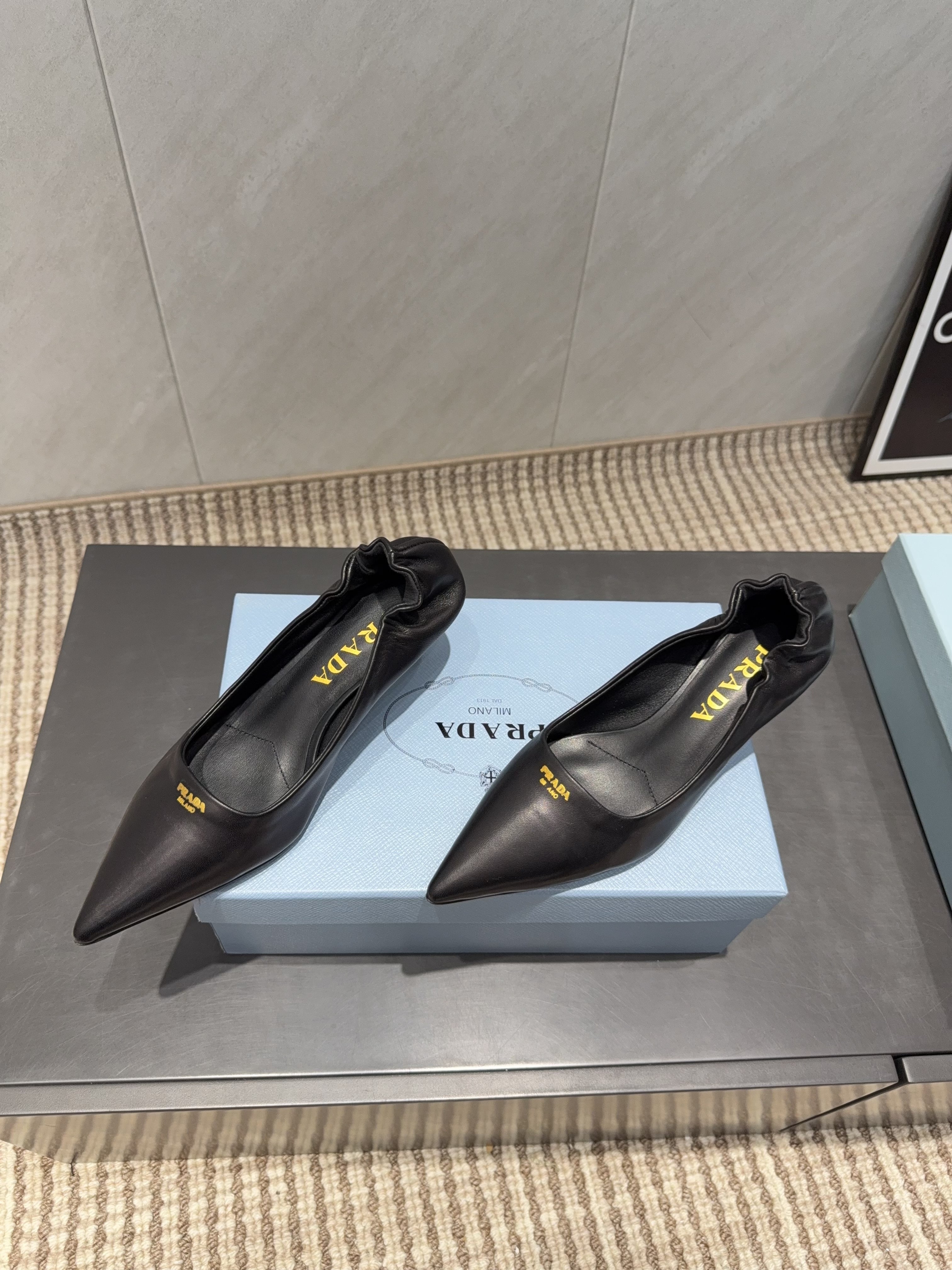PRADA 26S POINTED TOE PUMPS 55MM IN BLACK SHEEPSKIN