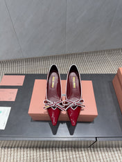 MIUMIU 26S POINTED TOE PUMPS 55MM IN DARK RED CALFSKIN WITH BOW