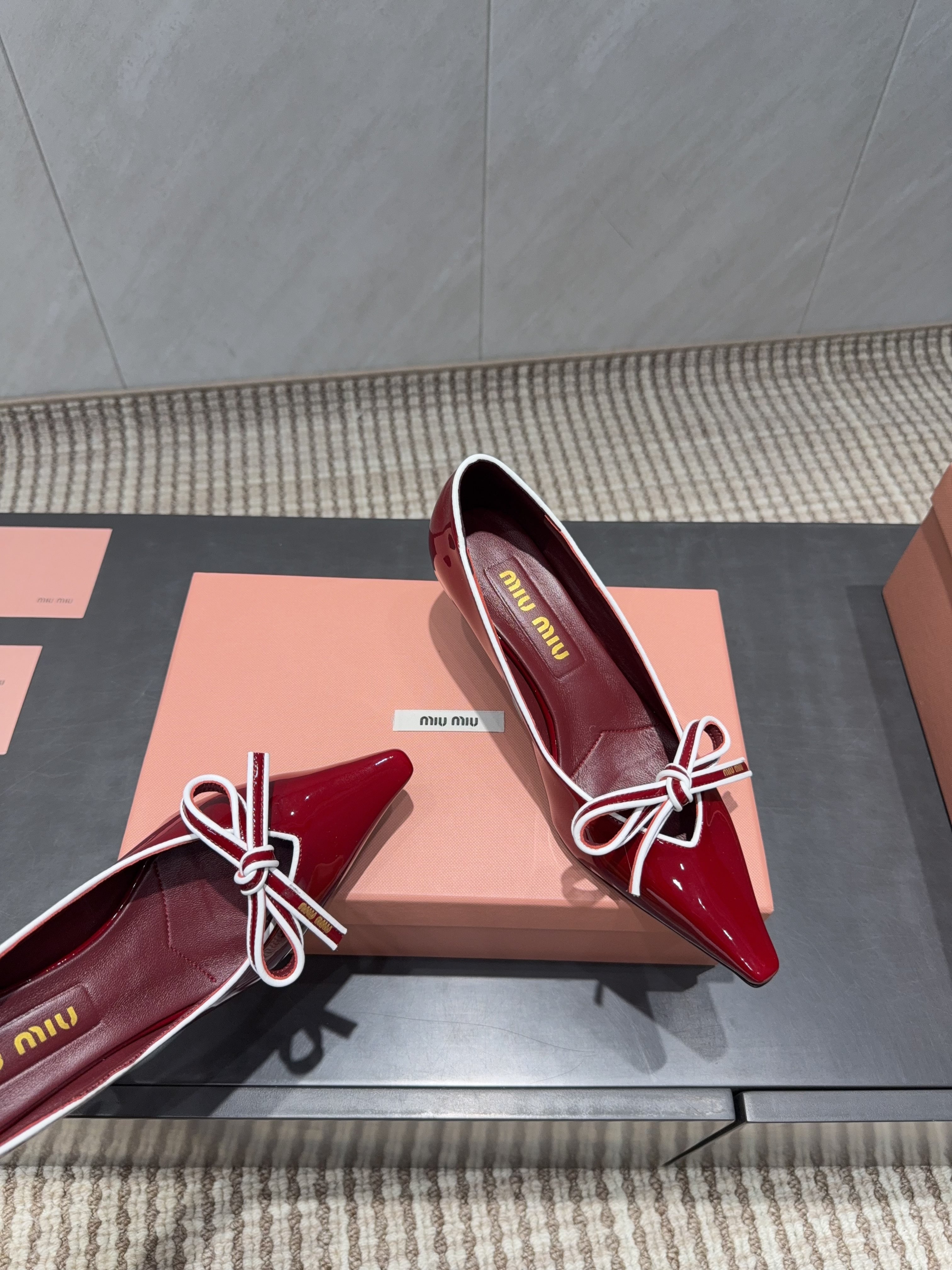 MIUMIU 26S POINTED TOE PUMPS 55MM IN DARK RED CALFSKIN WITH BOW