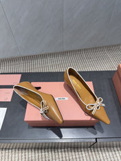 MIUMIU 26S POINTED TOE PUMPS 55MM IN CARAMEL BROWN CALFSKIN WITH BOW