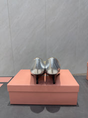 MIUMIU 26S POINTED TOE PUMPS 55MM IN SILVER CALFSKIN WITH BOW