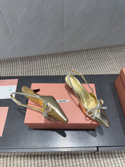 MIUMIU 26S SLINGBACK 55MM IN GOLD CALFSKIN WITH BOW