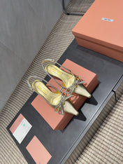 MIUMIU 26S SLINGBACK 55MM IN GOLD CALFSKIN WITH BOW