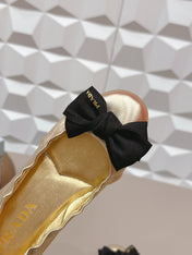PRADA 26S ROUND TOE FLATS WITH BOW IN GOLD CALFSKIN