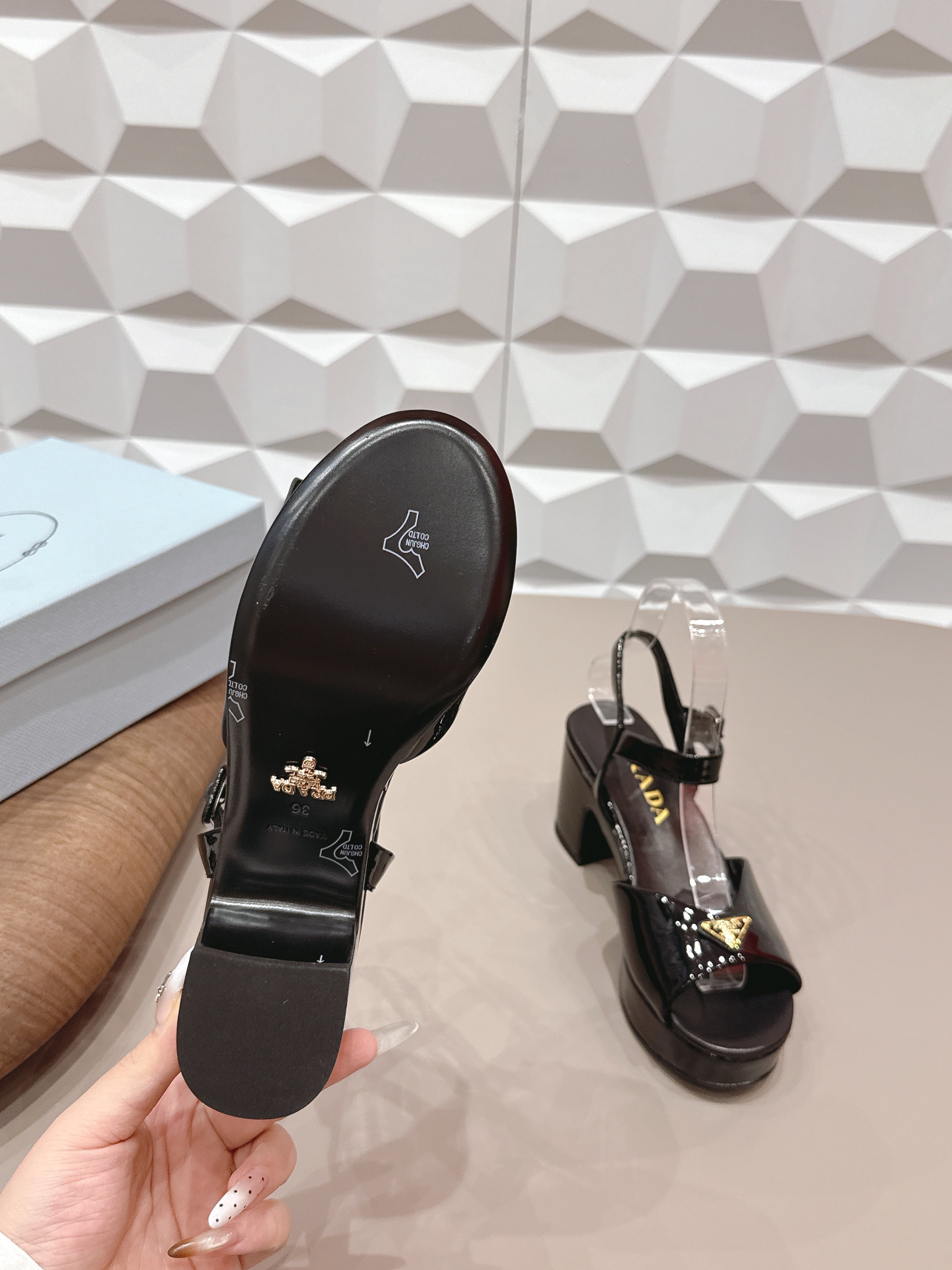 PRADA 26S HEELED SANDALS 75MM IN BLACK PATENT CALFSKIN WITH LOGO