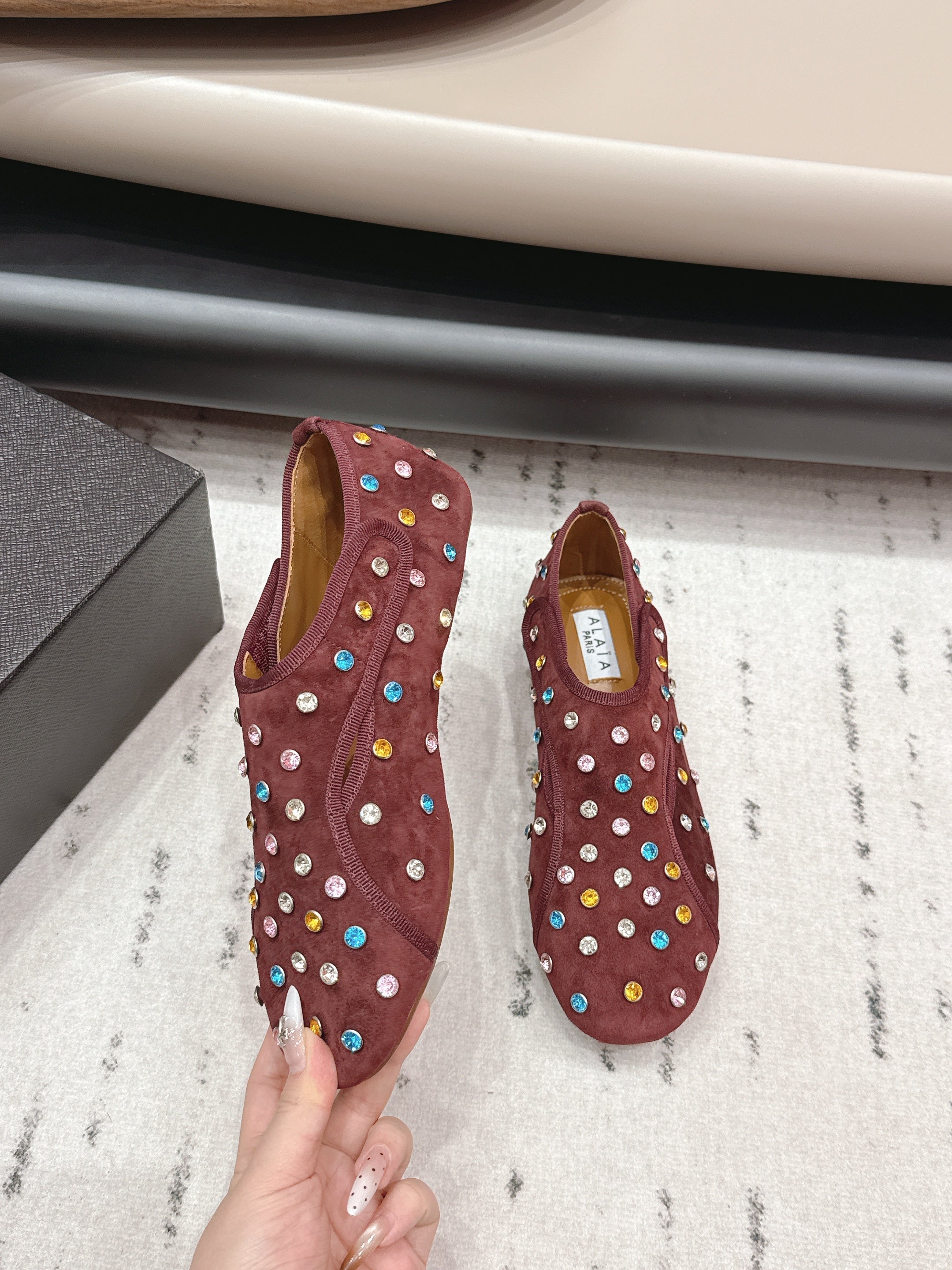 ALAIA 26S EMBELLISHED FLATS IN BROWN SUEDE