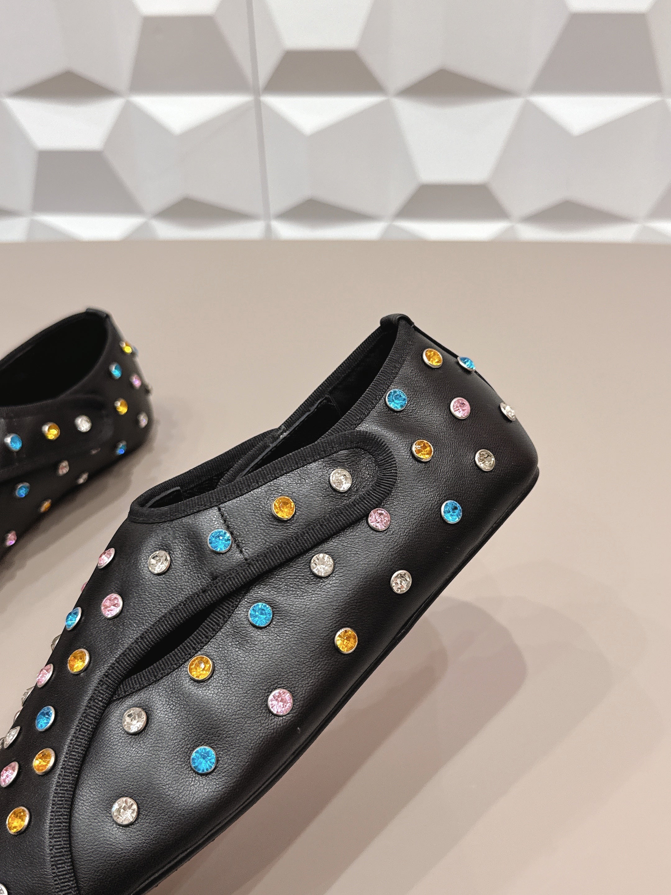 ALAIA 26S EMBELLISHED FLATS IN BLACK LAMBSKIN