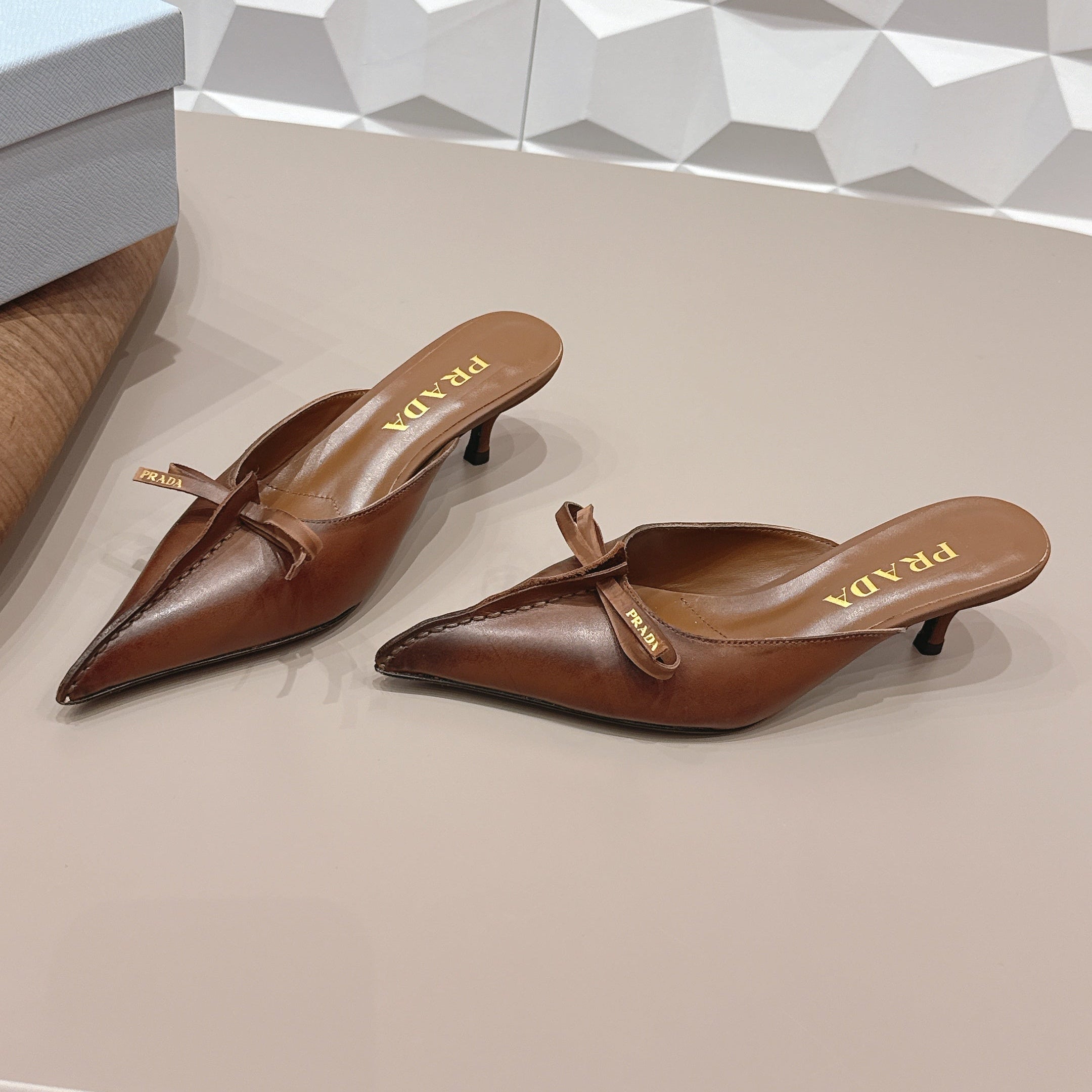 PRADA 26S POINTED TOE LACE TRIM MULES 55MM IN BROWN CALFSKIN WITH BOW