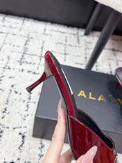 ALAIA 26S HEELED MULES 65 MM IN DARK RED GLOSSY CALFSKIN
