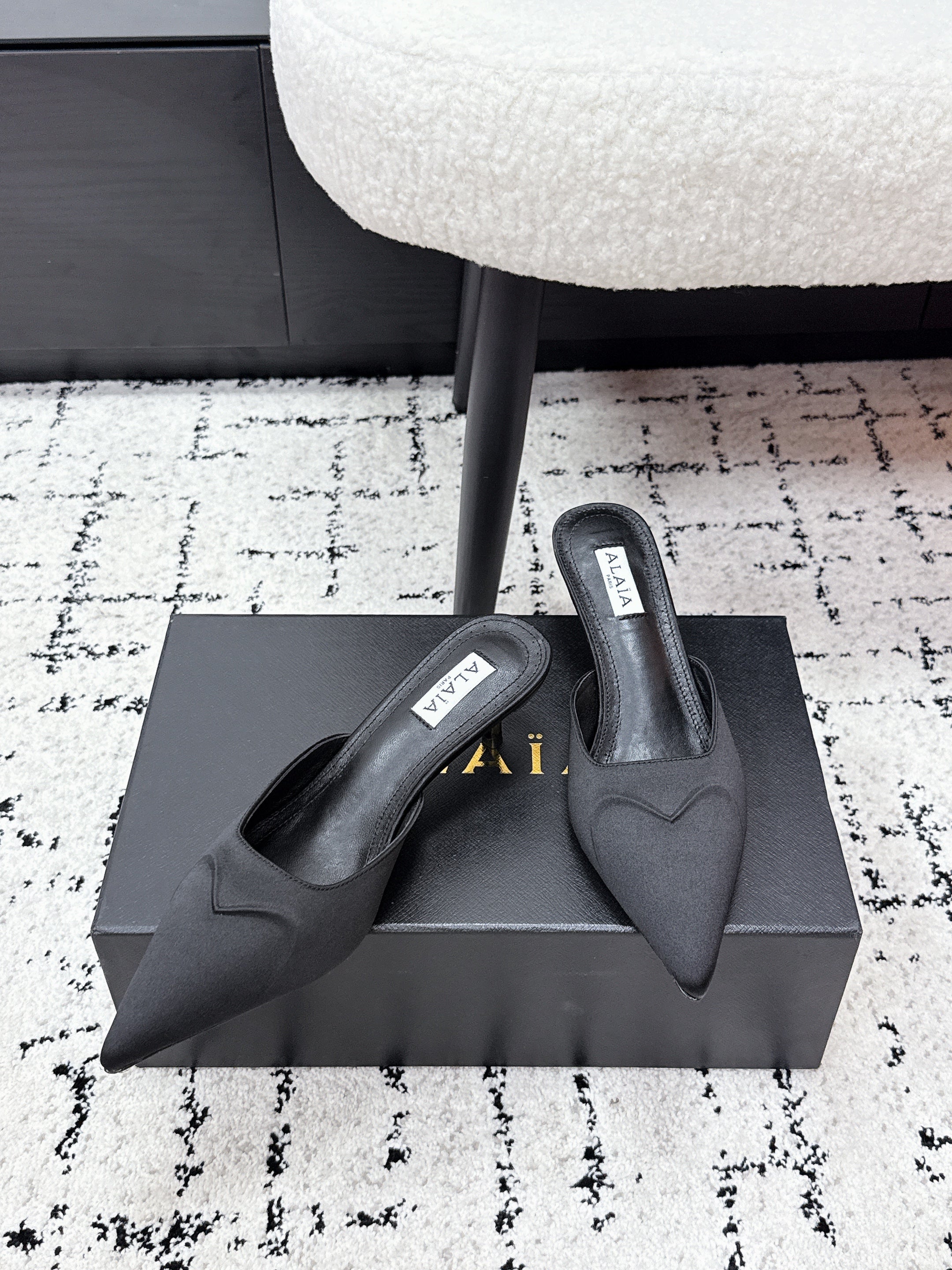 ALAIA 26S HEELED MULES 65 MM IN BLACK SATIN