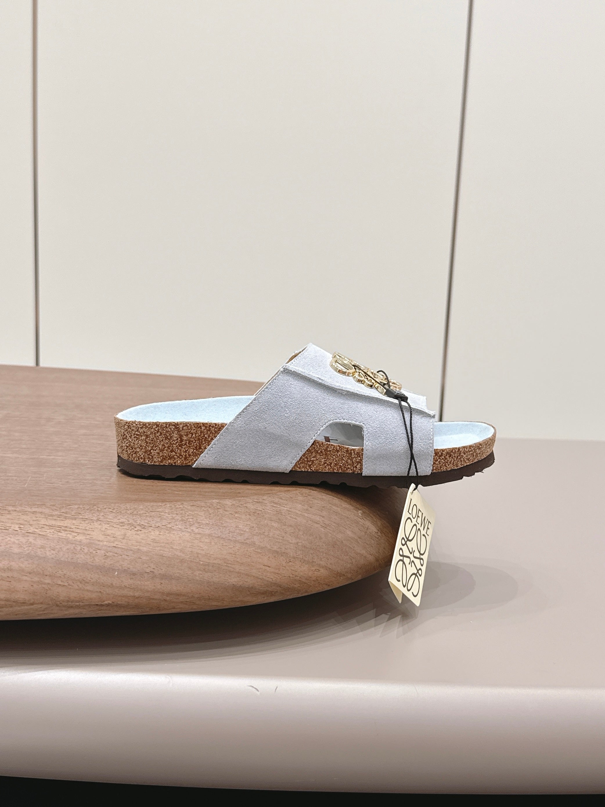 LOEWE 26S FLAT SANDALS IN LIGHT BLUE LOGO GOLD HARDWARE