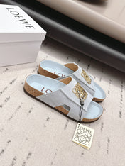 LOEWE 26S FLAT SANDALS IN LIGHT BLUE LOGO GOLD HARDWARE