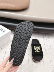 LOEWE 26S FLAT SANDALS IN BLACK LOGO GOLD HARDWARE