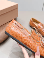 MIUMIU 26S BOAT SHOES IN ORANGE BROWN EMBOSSED CALFSKIN