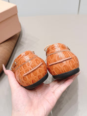 MIUMIU 26S BOAT SHOES IN ORANGE BROWN EMBOSSED CALFSKIN