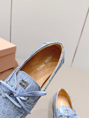 MIUMIU 26S BOAT SHOES IN BLUE EMBOSSED CALFSKIN