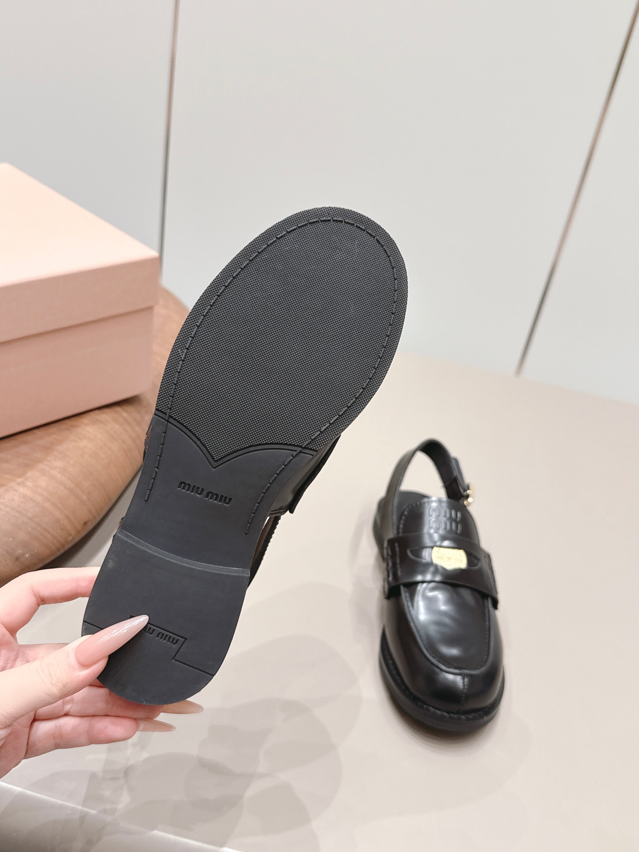 MIUMIU 26S PENNY SLINGBACK LOAFERS IN BLACK CALFSKIN GOLD HARDWARE