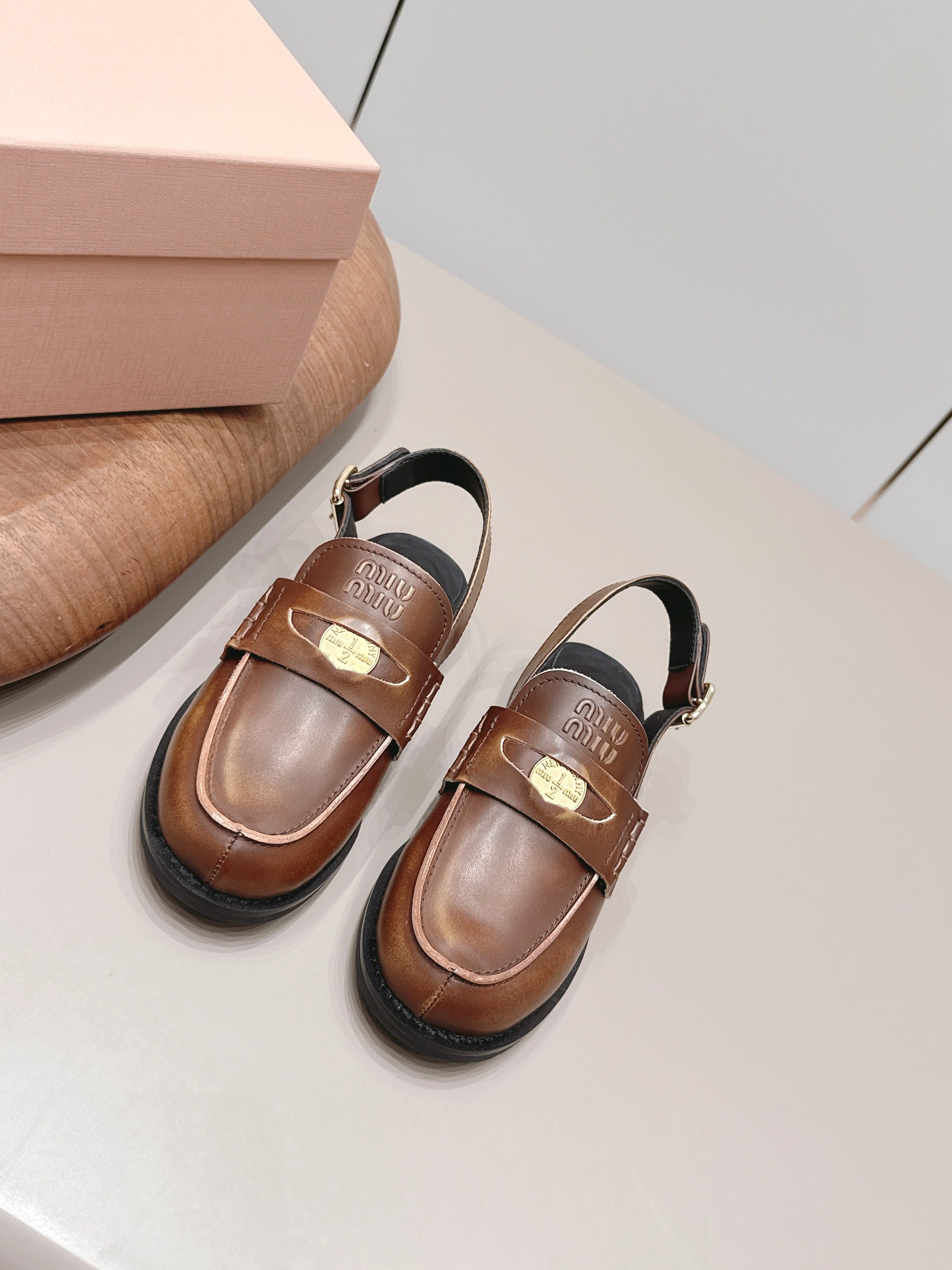 MIUMIU 26S PENNY SLINGBACK LOAFERS IN BROWN CALFSKIN GOLD HARDWARE