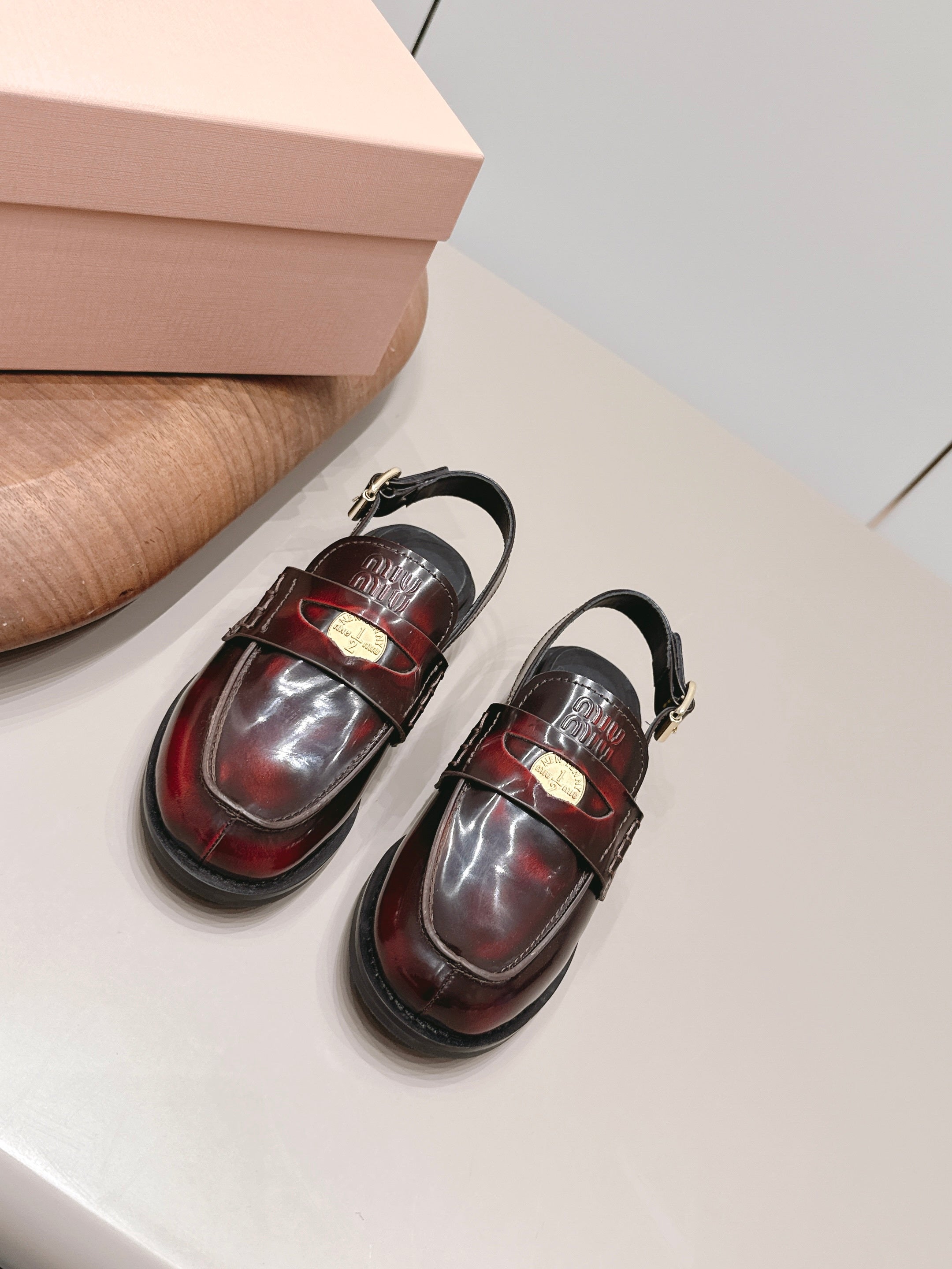 MIUMIU 26S PENNY SLINGBACK LOAFERS IN BURGUNDY RED CALFSKIN GOLD HARDWARE