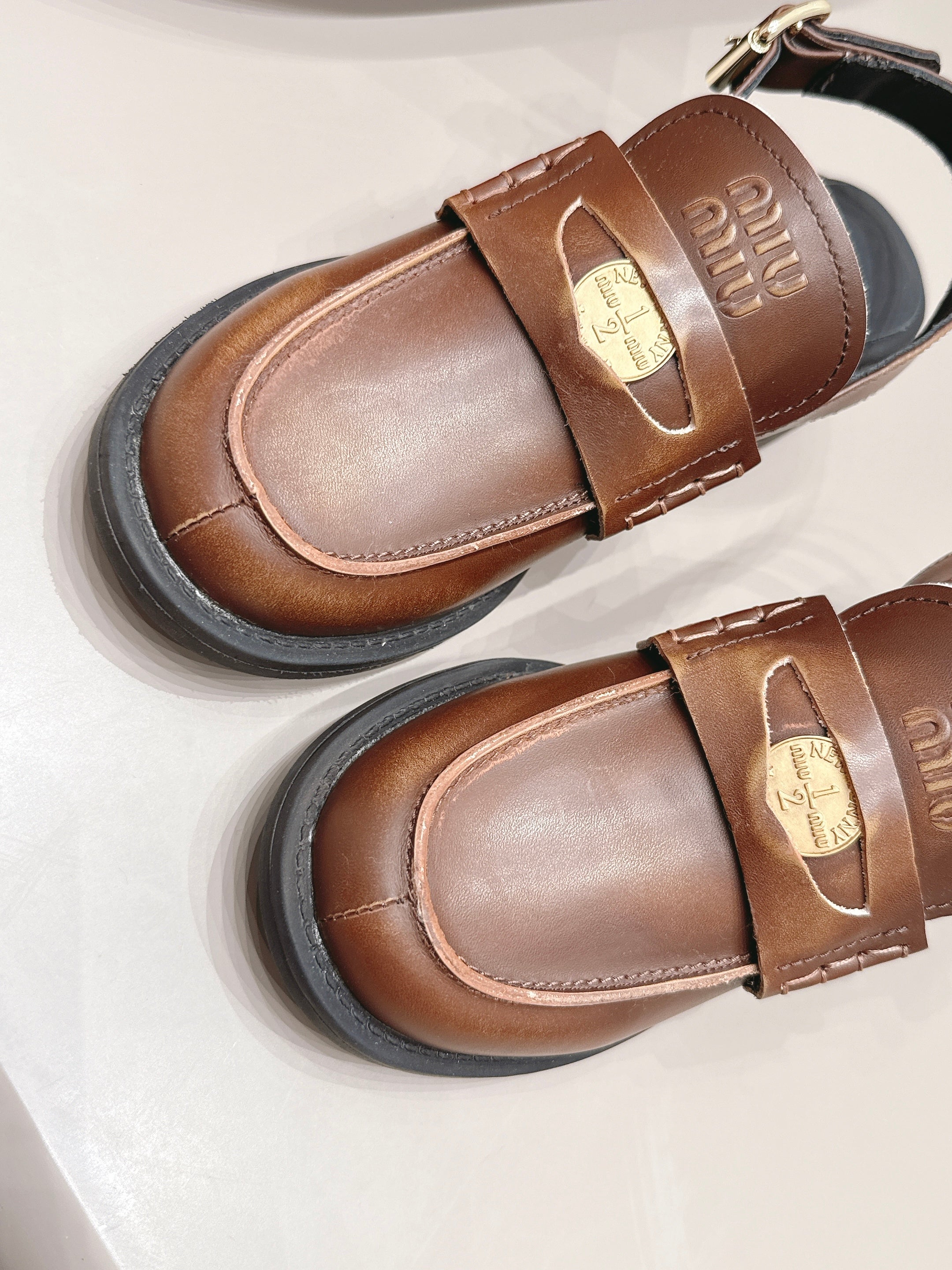 MIUMIU 26S BLOCK HEEL PENNY SLINGBACK LOAFERS 50MM IN BROWN CALFSKIN