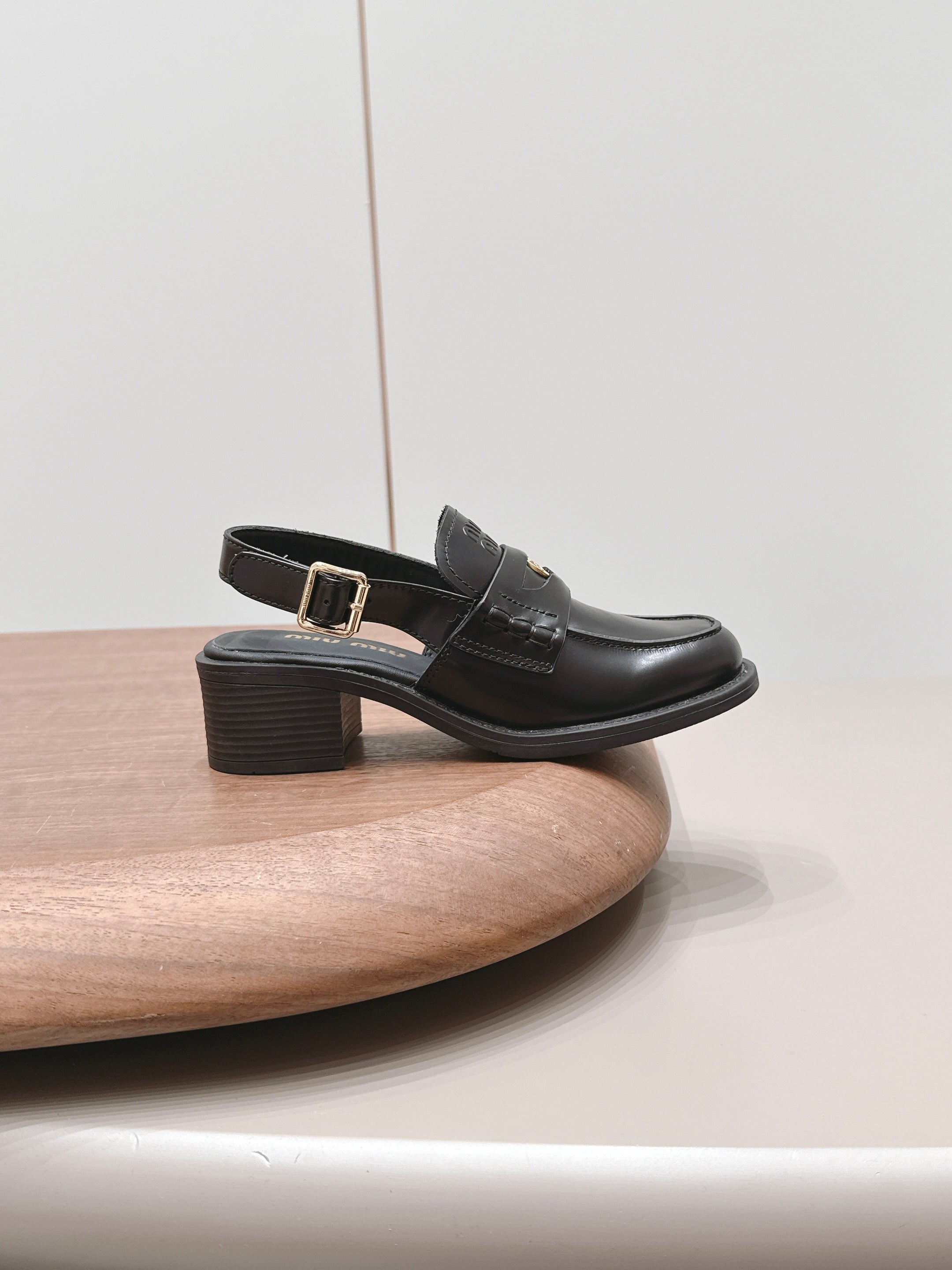 MIUMIU 26S BLOCK HEEL PENNY SLINGBACK LOAFERS 50MM IN BLACK CALFSKIN