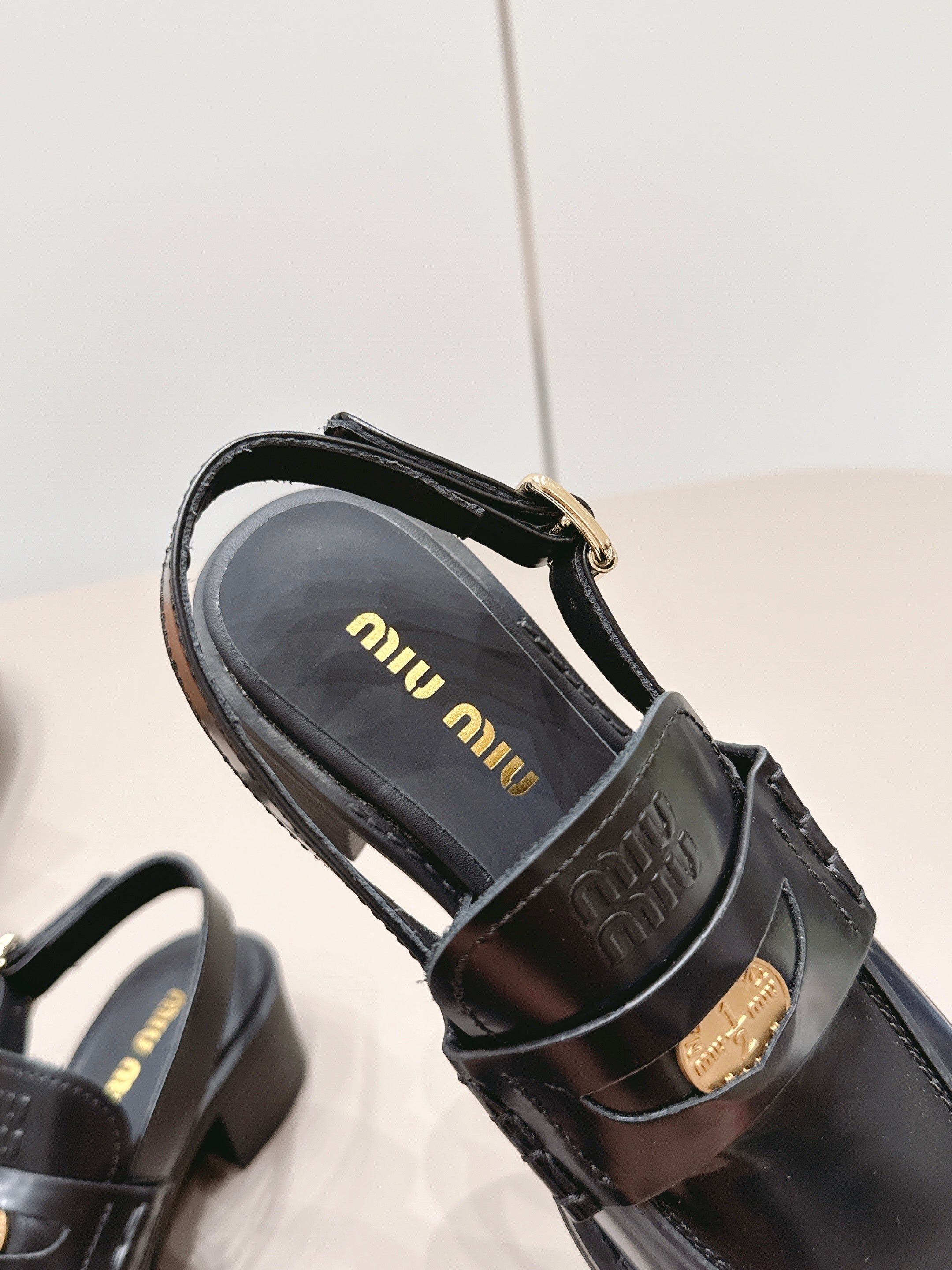 MIUMIU 26S BLOCK HEEL PENNY SLINGBACK LOAFERS 50MM IN BLACK CALFSKIN