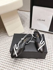 CHANEL 26S SLINGBACK FLATS IN BLACK CALFSKIN WITH WHITE TRIM