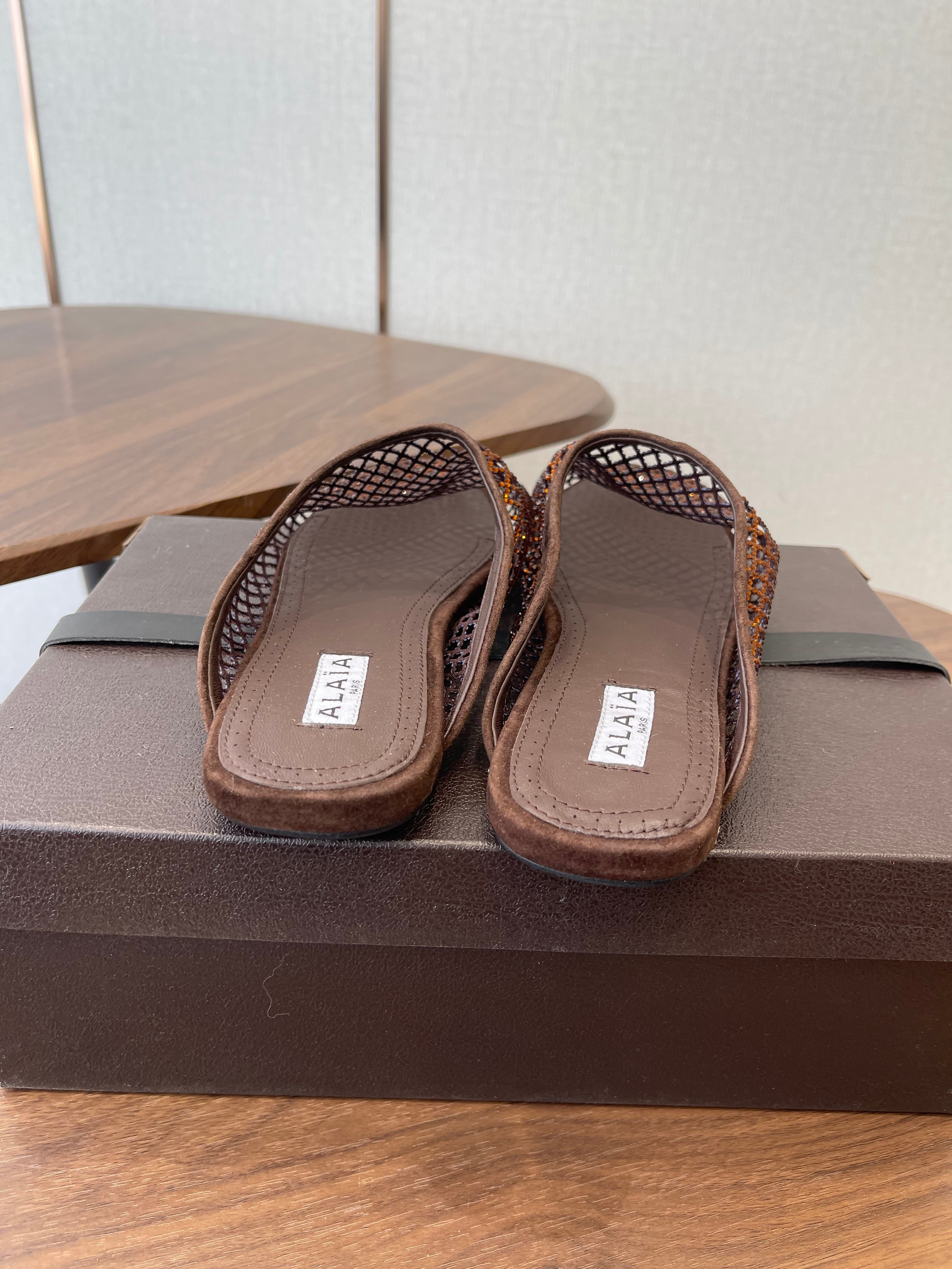 ALAIA 26S FLAT MULES IN DARK BROWN SUEDE AND MESH RHINESTONE-EMBELLISHED