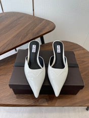 ALAIA 26S HEELED MULES 50 MM IN WHITE GLOSSY CALFSKIN