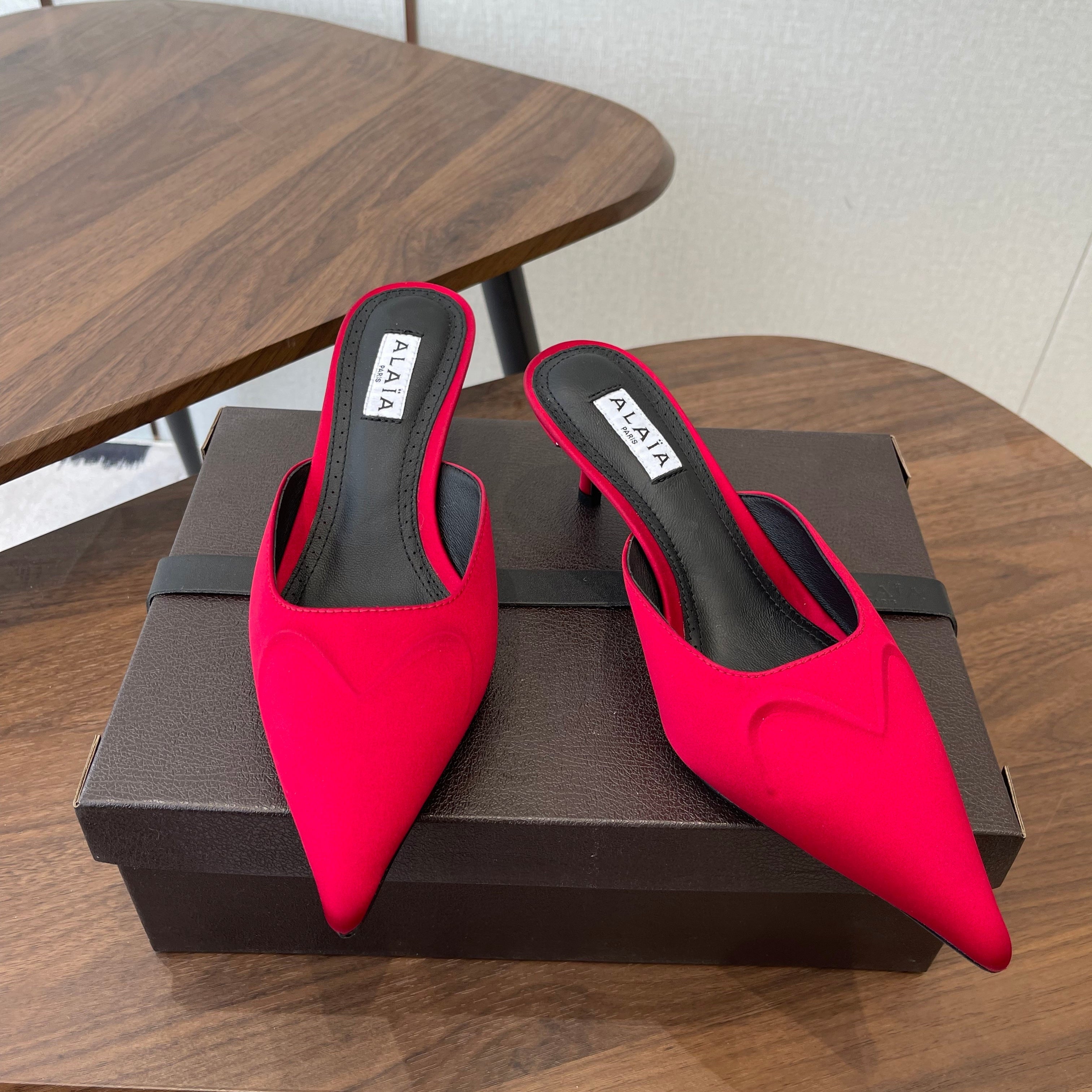 ALAIA 26S HEELED MULES 50 MM IN RED FABRIC