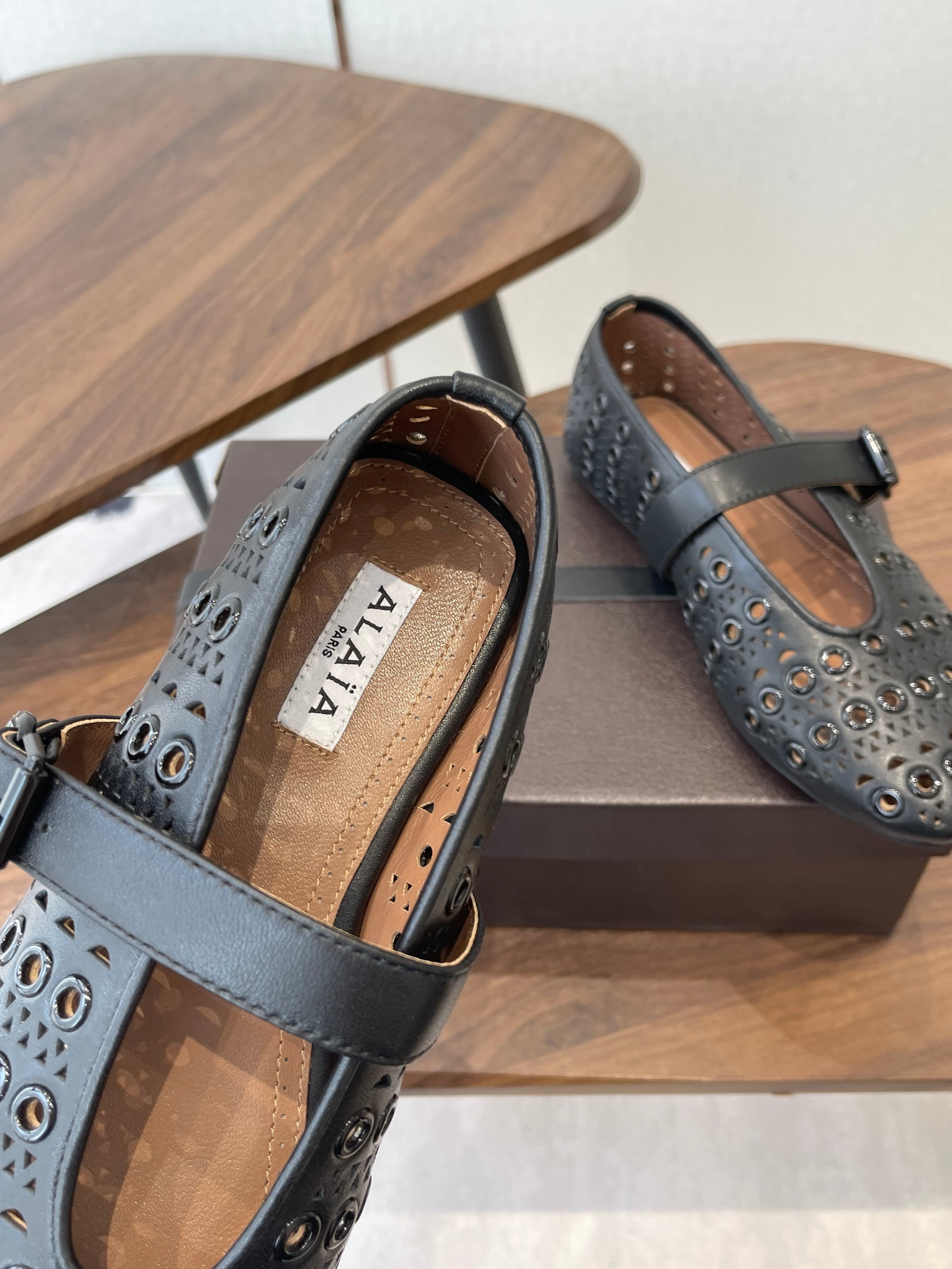 ALAIA 26S MARY JANE FLATS IN BLACK LAMBSKIN