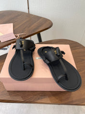 MIUMIU 26S FLIP FLOPS IN BLACK CALFSKIN