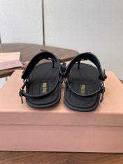 MIUMIU 26S FLIP FLOPS IN BLACK CALFSKIN