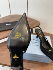 PRADA 26S SLINGBACK PUMPS 75MM IN BLACK SUEDE WITH LOGO