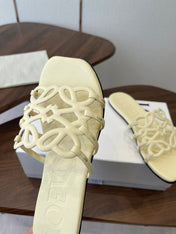 LOEWE 26S FLAT SANDALS IN LIGHT YELLOW CALFSKIN