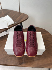THE ROW 26S SNEAKERS IN BURGUNDY RED CALFSKIN