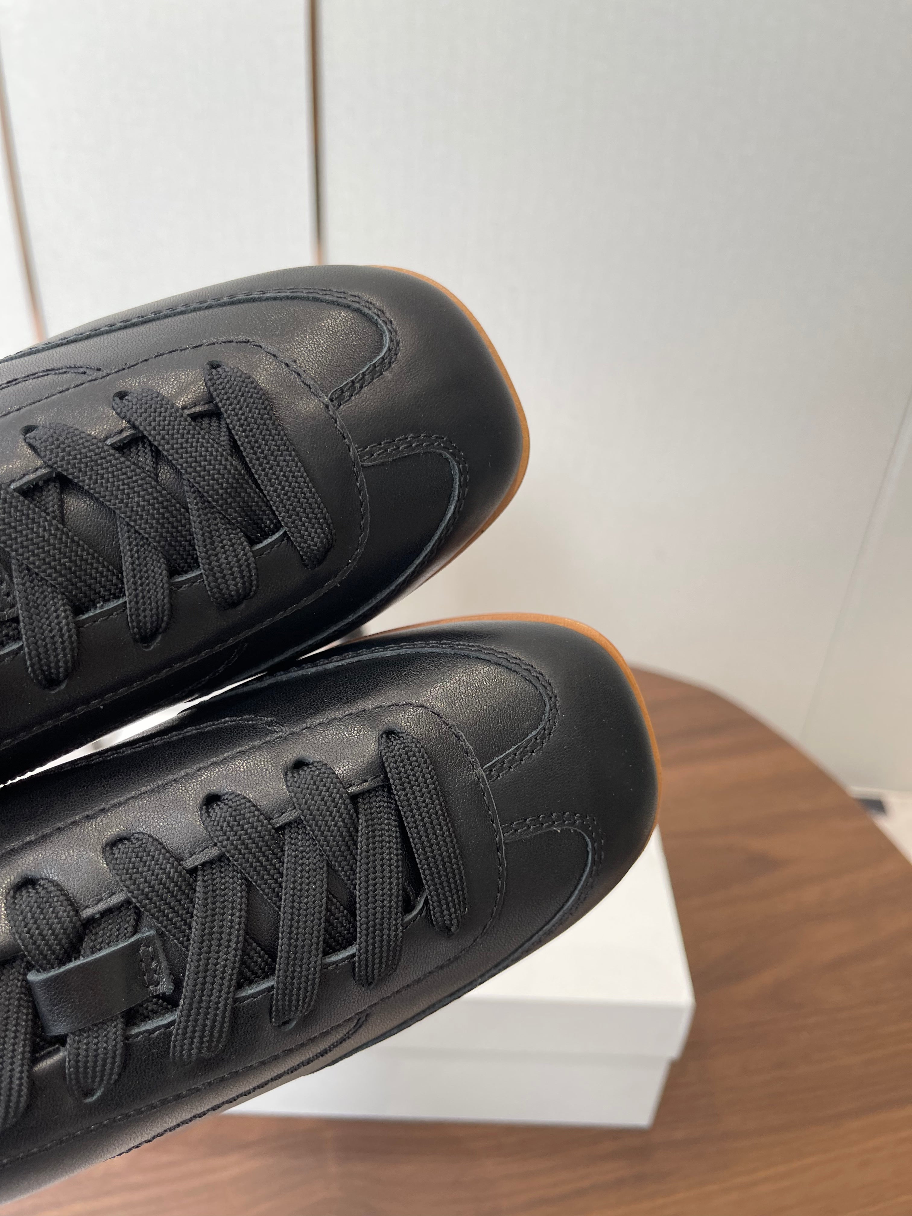 THE ROW 26S SNEAKERS IN BLACK CALFSKIN
