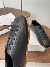 THE ROW 26S SNEAKERS IN BLACK CALFSKIN