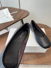 THE ROW 26S FLATS IN BLACK CALFSKIN