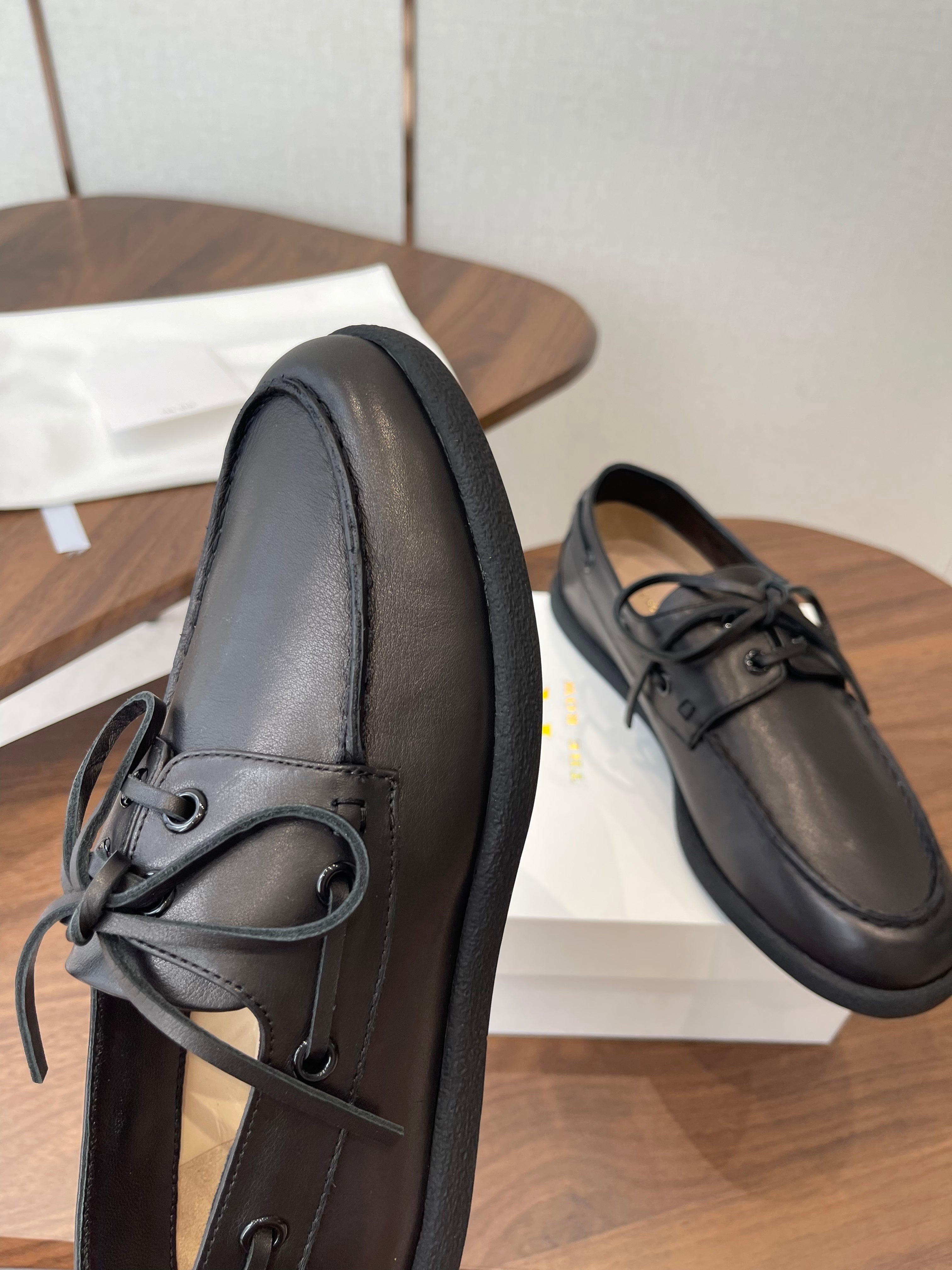 THE ROW 26S LOAFERS IN BLACK CALFSKIN