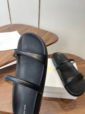 THE ROW 26S DOUBLE STRAP FLAT SANDALS IN BLACK CALFSKIN