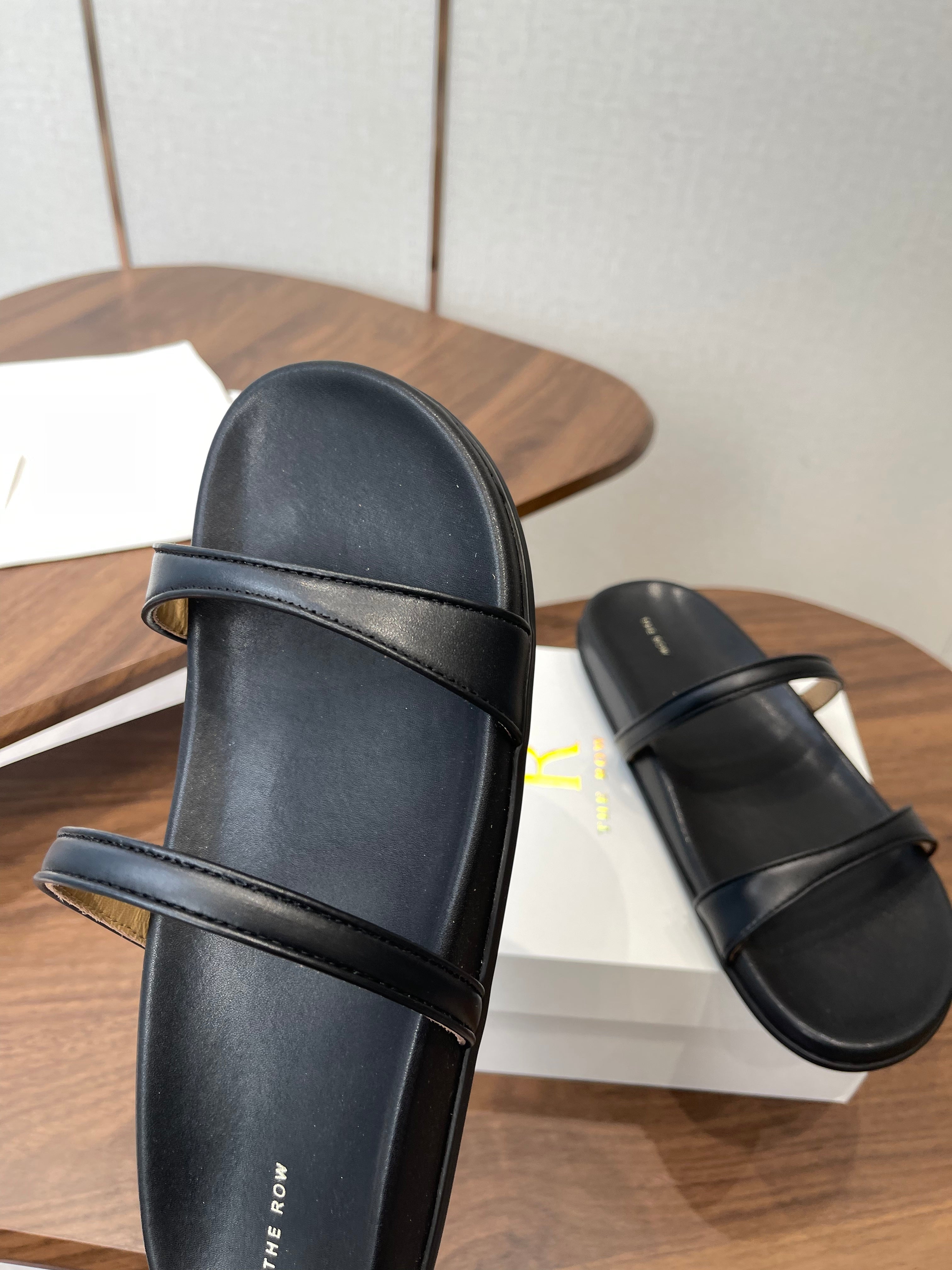 THE ROW 26S DOUBLE STRAP FLAT SANDALS IN BLACK CALFSKIN